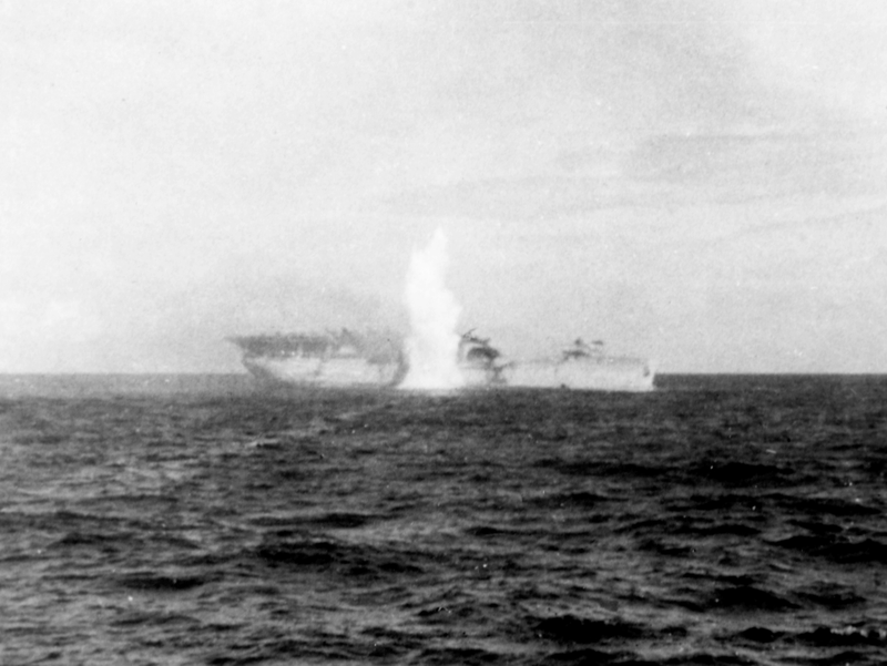 Langley hit by torpedo